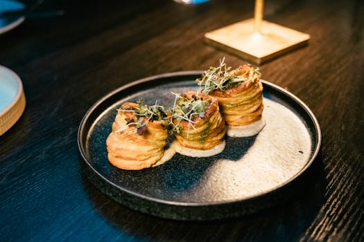 Exquisite fine dining dish artfully presented in a Calgary restaurant setting.