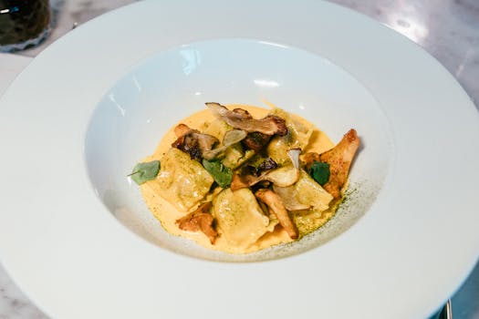 Delicious plate of mushroom ravioli in a gourmet setting, perfect for fine dining enthusiasts.