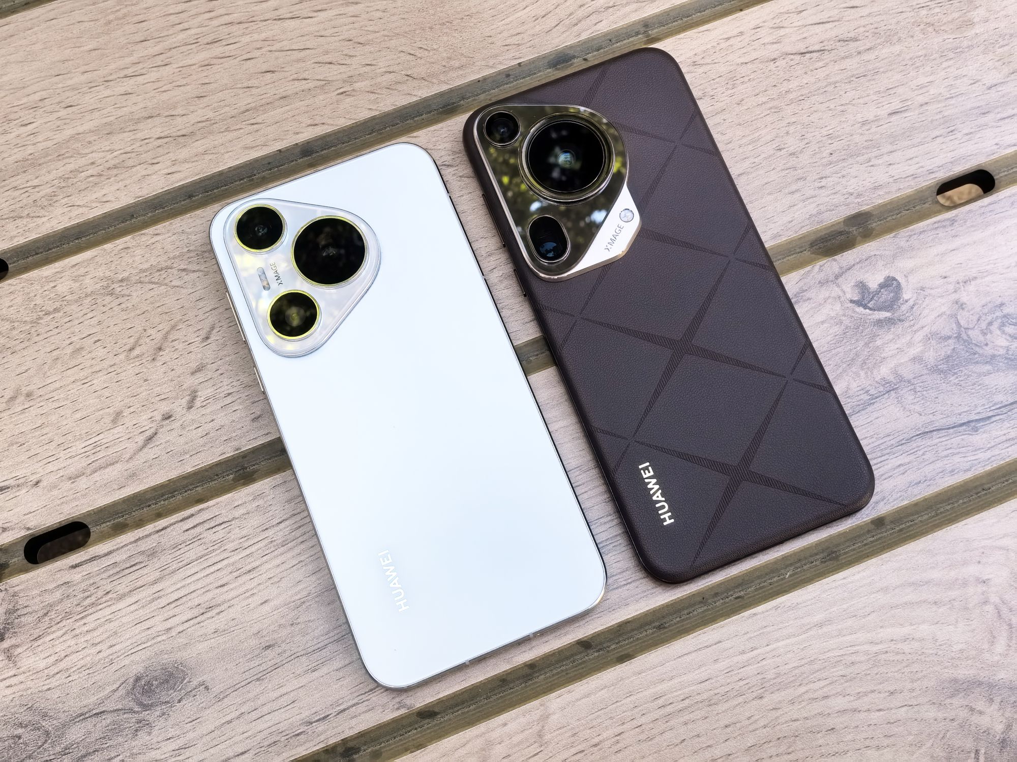 Modern Mobile Phones on Wooden Table · Free Stock Photo