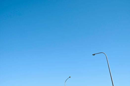 Photo of Street Lights Against Blue Sky