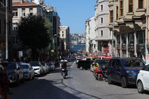Free Vibrant street view in Istanbul with motorbikes and cars under bright daylight. Stock Photo