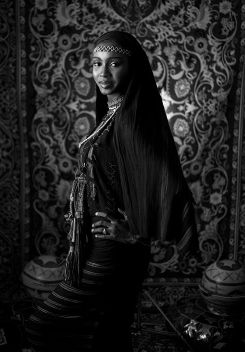Free Black and white portrait of a woman in traditional attire, exuding elegance and cultural richness. Stock Photo