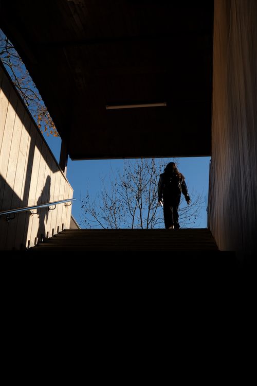 Free A person walks through a shadowy tunnel in Bursa, capturing a moody urban scene. Stock Photo