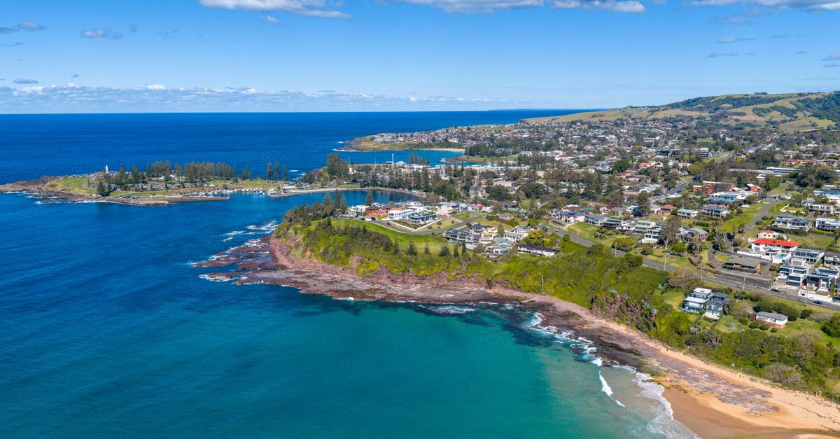 Stunning aerial view of coastline and townscape in Kiama, New South Wales, Australia, on a sunny summer day.