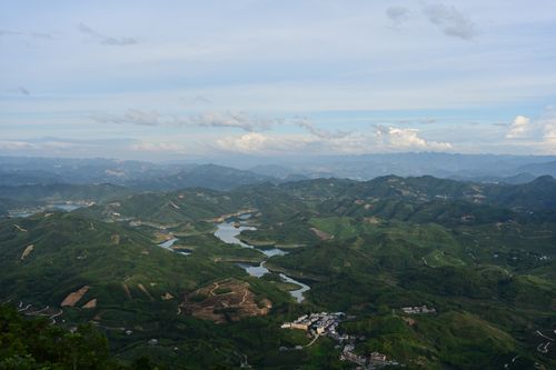 Free Captivating aerial vista of lush greenery and winding rivers in Guizhou, China. Stock Photo