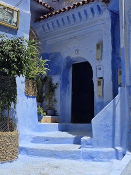 Striking blue facade in Chefchaouen's old town, showcasing traditional Moroccan architecture.