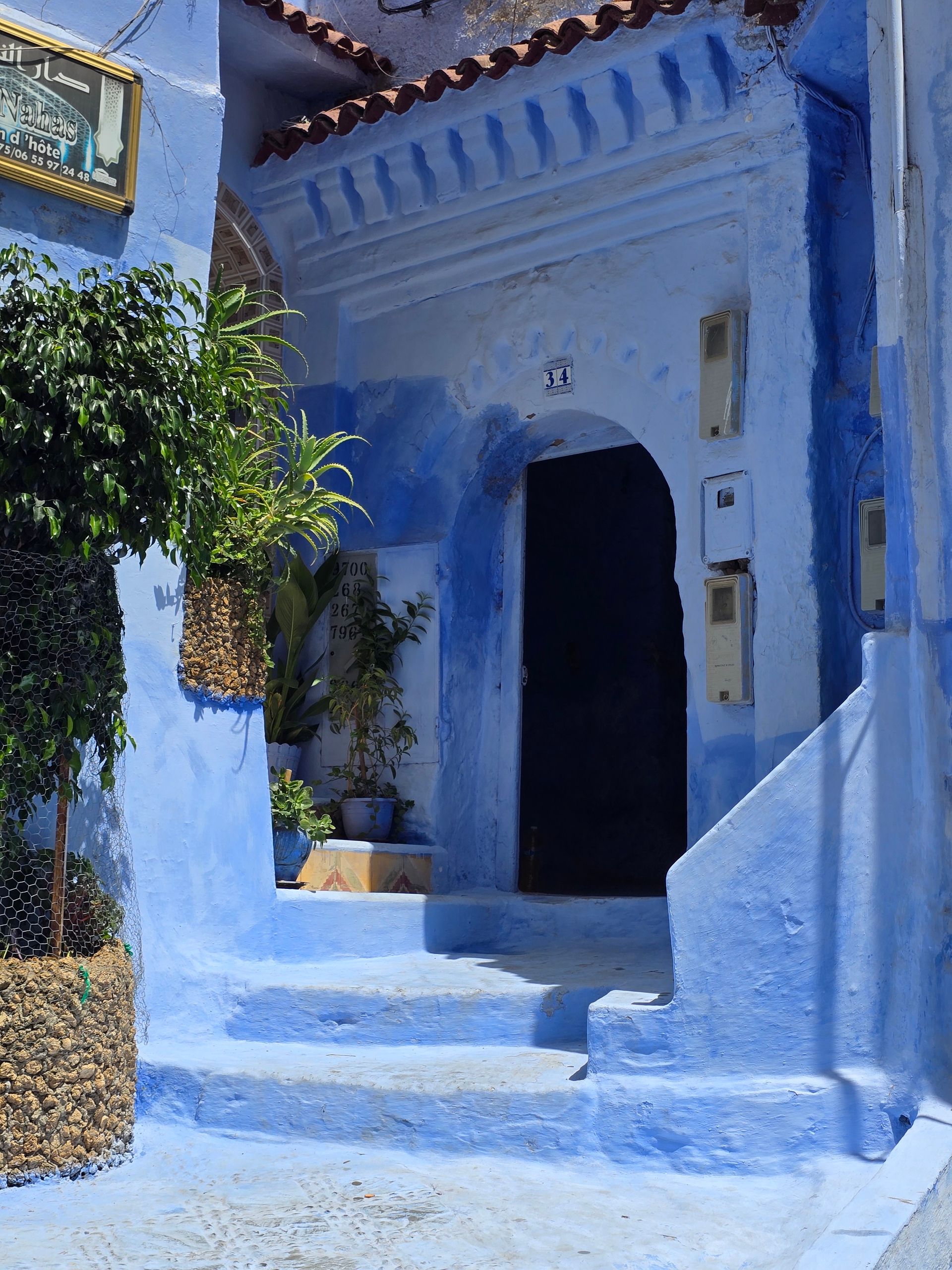 Blue-painted alleyway in Chefchaouen, Morocco