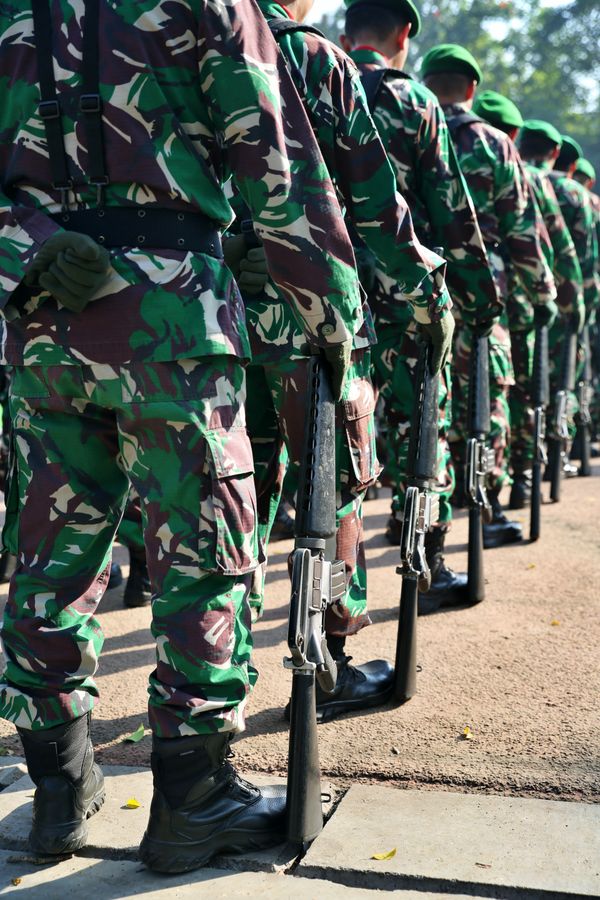 A group of soldiers standing on a hill · Free Stock Photo