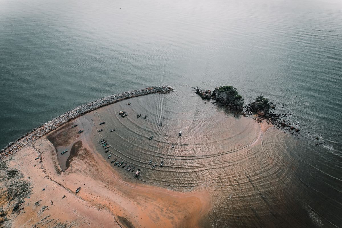 Aerial View of a River Mouth Flowing into the Sea · Free Stock Photo