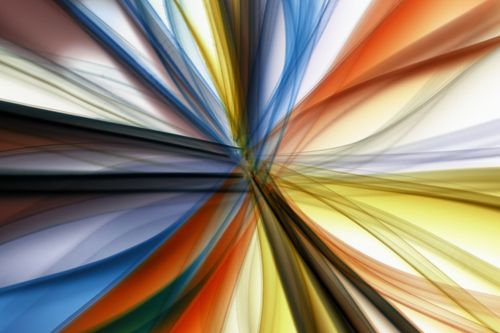 Free An abstract image with an explosion of colorful light streaks creating a dynamic effect. Stock Photo