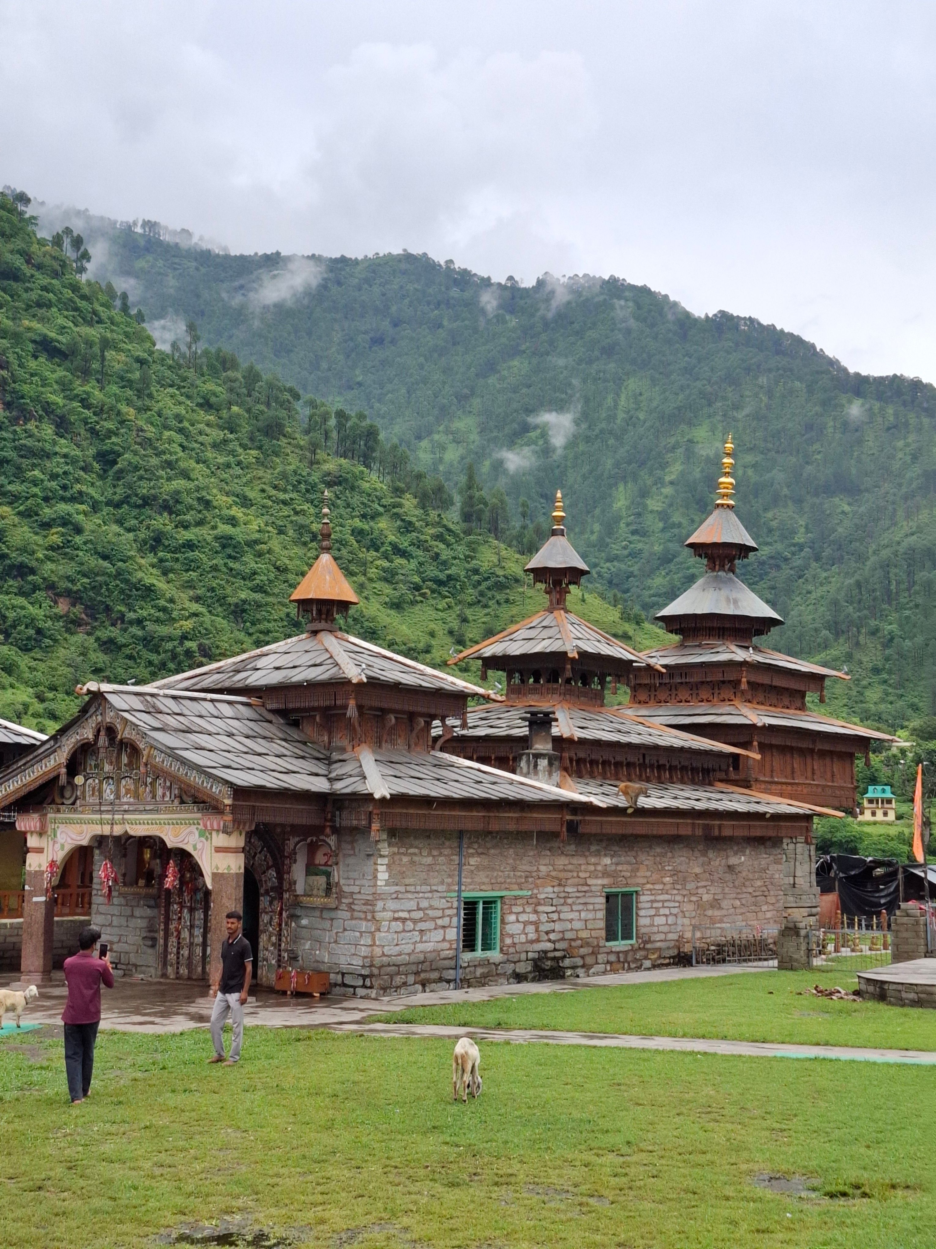 Rustic Wooden Temple Amidst Lush Mountains · Free Stock Photo