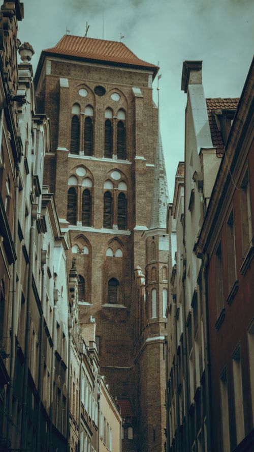 Free Capture of St. Mary's Church, a medieval landmark, in Gdańsk's historic old town. Stock Photo