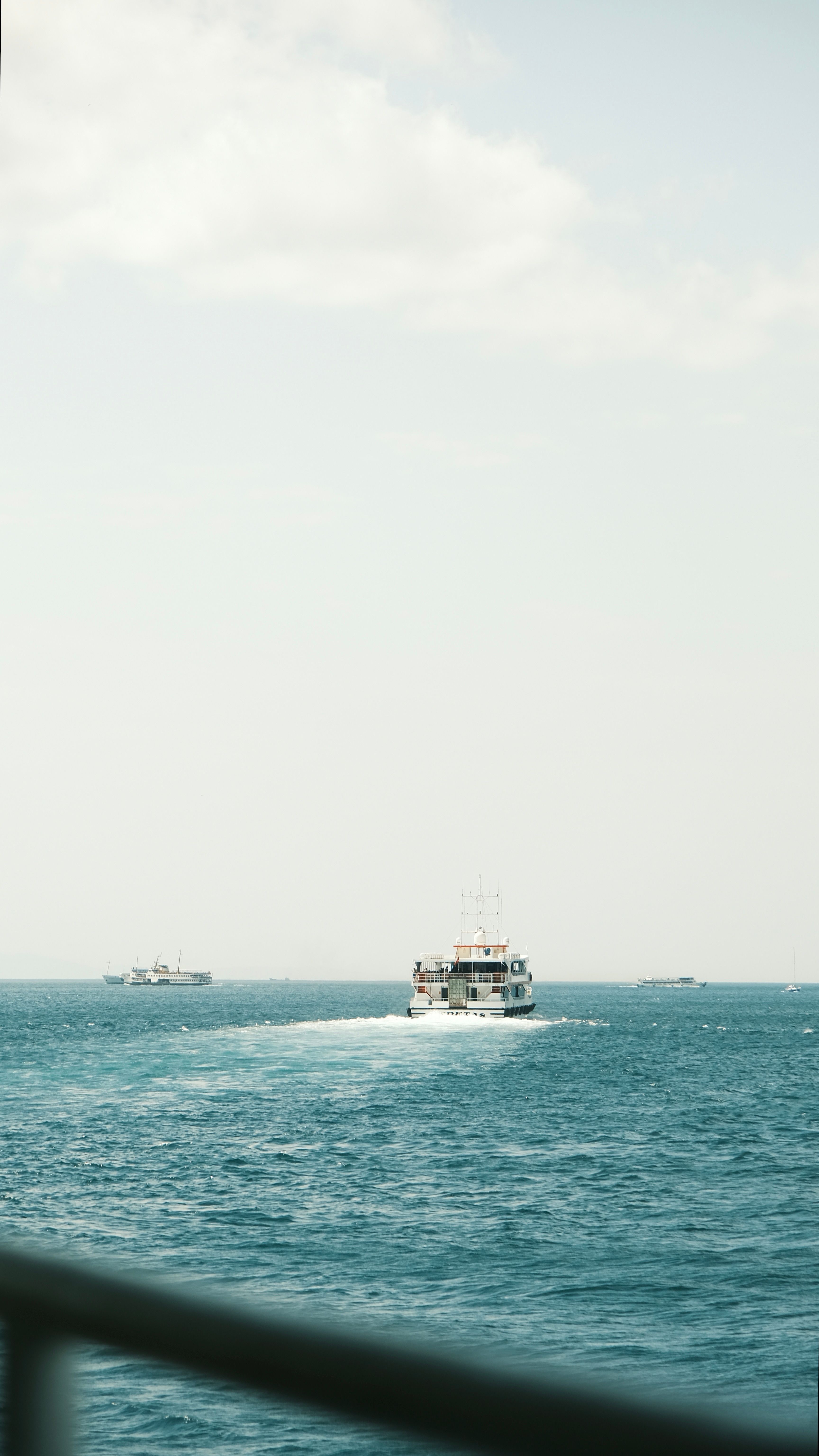 Serene Maritime Scene with Ferry at Sea