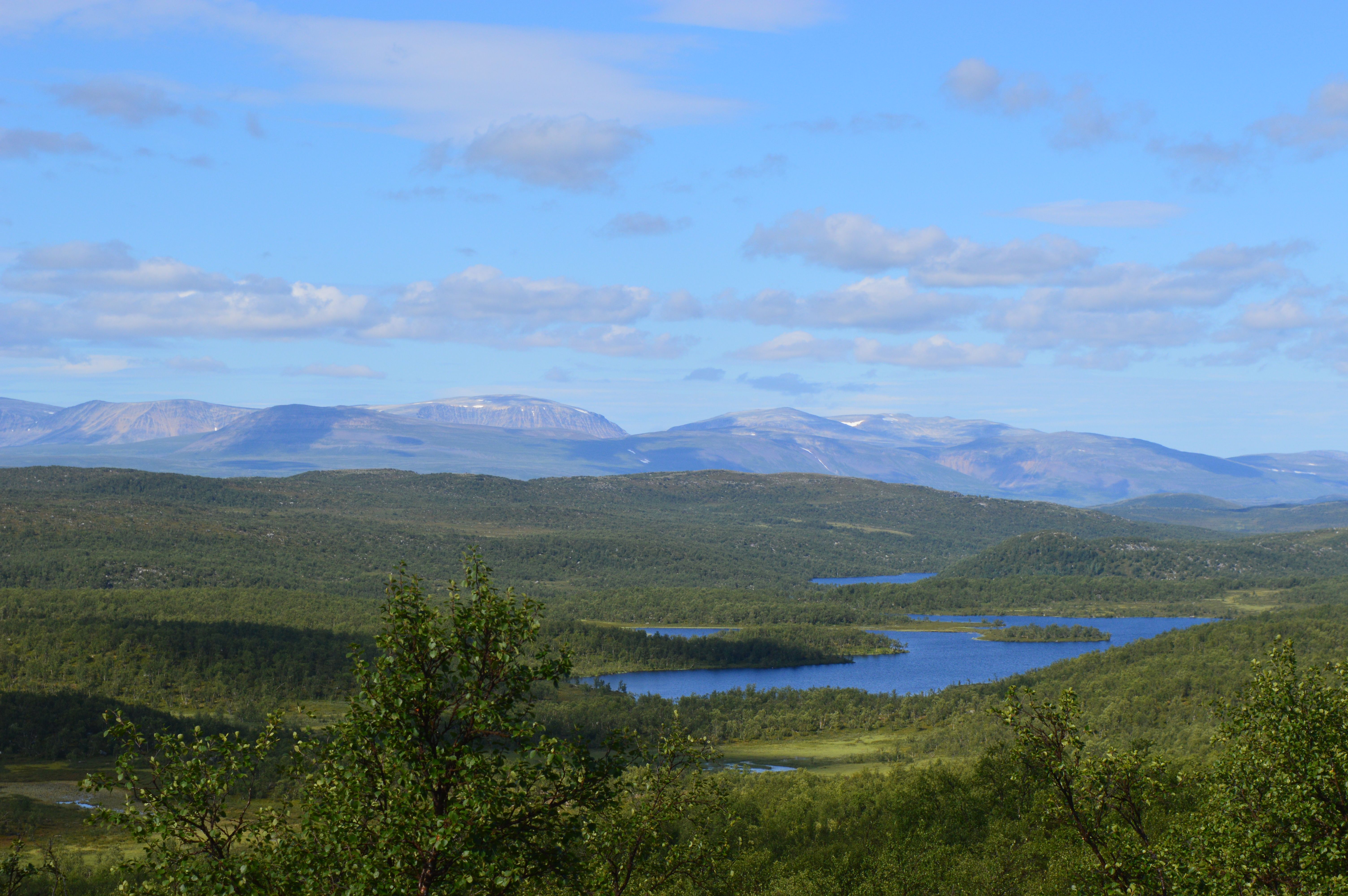 Majestic view of lakes and mountains in Porsangmoen, Finnmark, Norway on a sunny day.