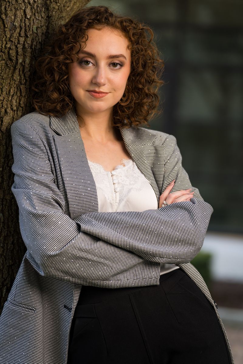 Lucía Ferrer Abad, senior associate in employment law, arms crossed