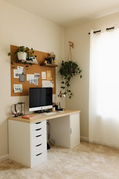 Stylish home office with plants and a computer for productive remote work.