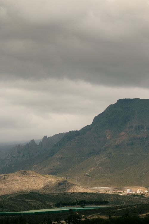Free Majestic mountain landscape under cloudy skies in Canary Islands, perfect for travel and nature enthusiasts. Stock Photo