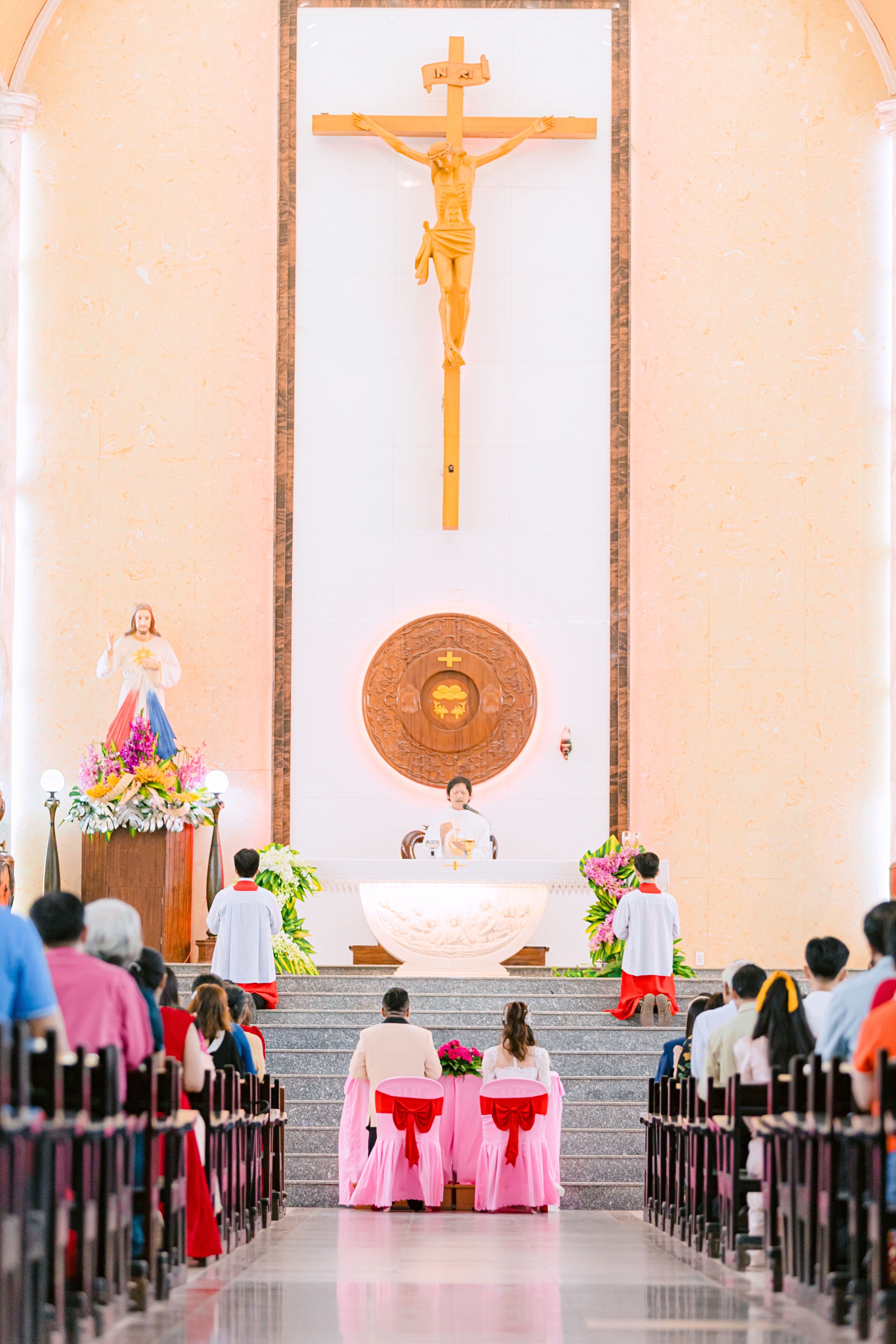 Church Management System — Congregation gathered inside a church during a service