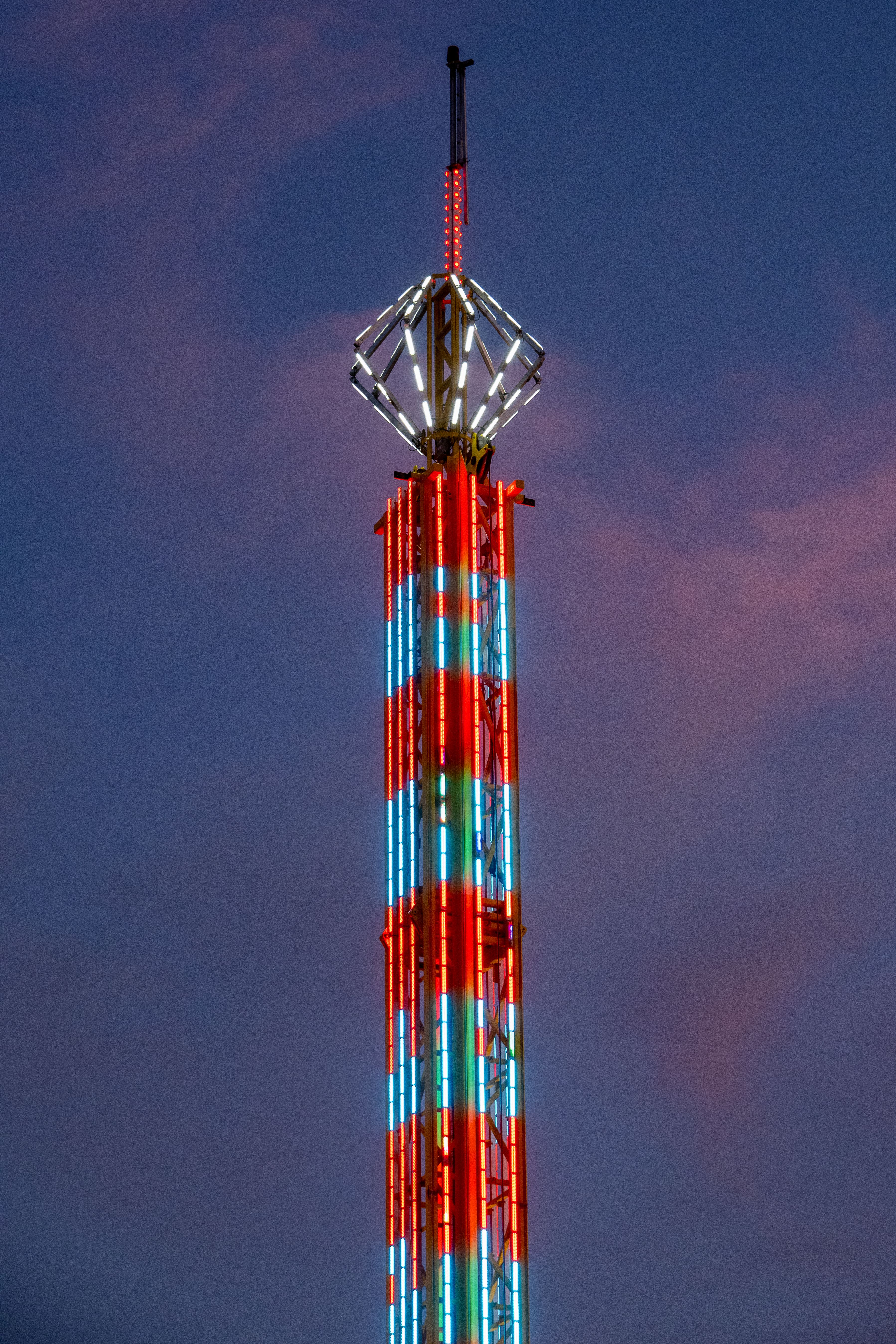 Vibrant Tower Ride Against Twilight Sky · Free Stock Photo