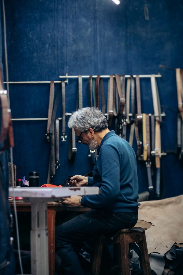 Craftsman at a leather bench, photo by Abdelilah Hibat Allah on Pexels