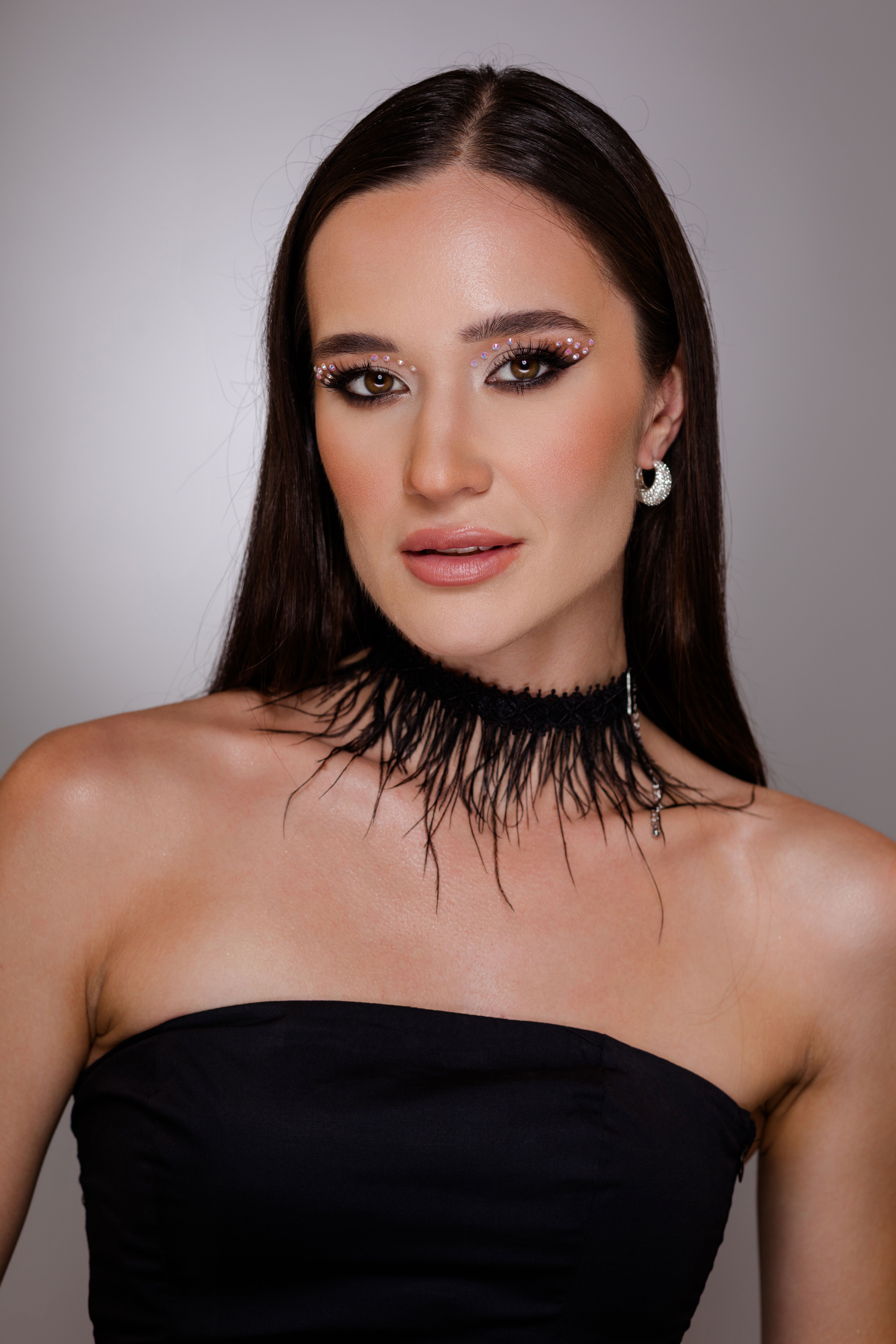 Elegant Portrait of a Woman with Glamour Makeup  Free Stock Photo