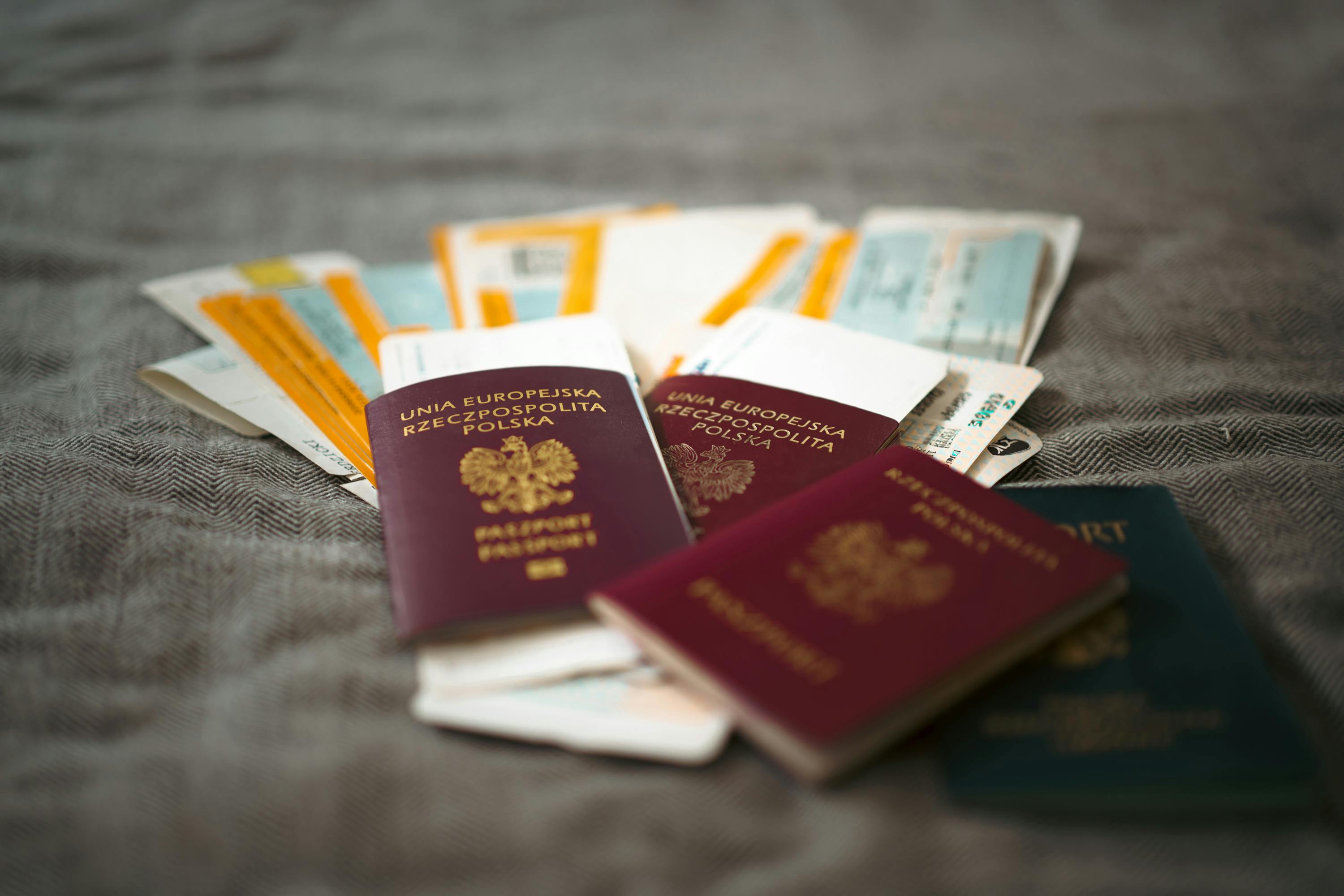 Traveler organizing passport and travel documents before international trip