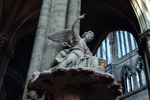 Stunning angel statue inside Amiens Cathedral showcasing gothic architecture details.