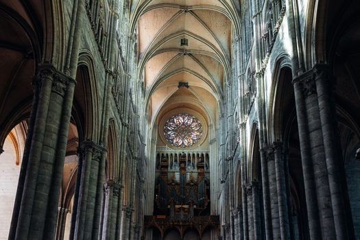Discover the stunning Gothic architecture of Amiens Cathedral, featuring intricate rose windows and vaulted ceilings.