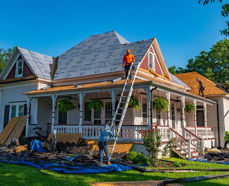 Home undergoing siding replacement in Hooper, Utah