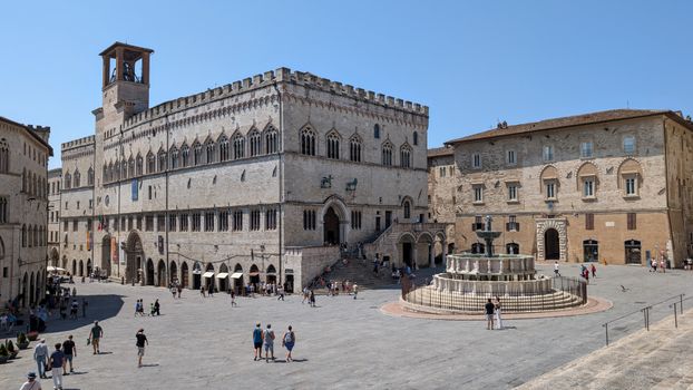 Explore the stunning medieval architecture of Perugia, Umbria with a view of the Palazzo dei Priori and Fontana Maggiore.