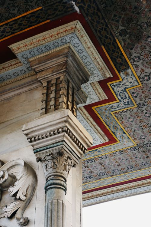 Free Close-up of a decorated column and ceiling, showcasing intricate designs. Stock Photo