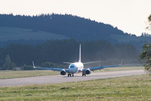 A commercial airliner ready for takeoff on the runway at Poprad Airport, Slovakia.