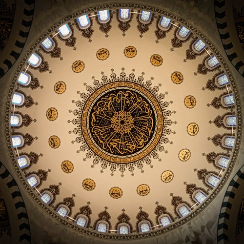 Free Captivating intricate geometric and floral patterns on a mosque dome ceiling in Ankara, Türkiye. Stock Photo