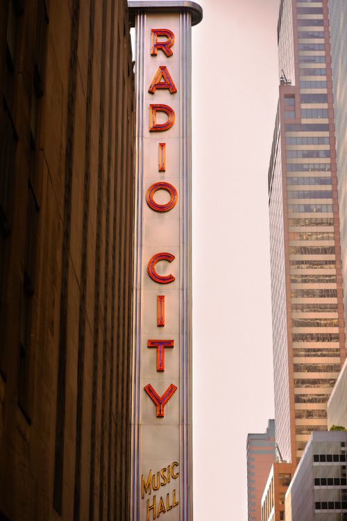 Free The iconic Radio City Music Hall sign in New York City is an architectural landmark. Stock Photo