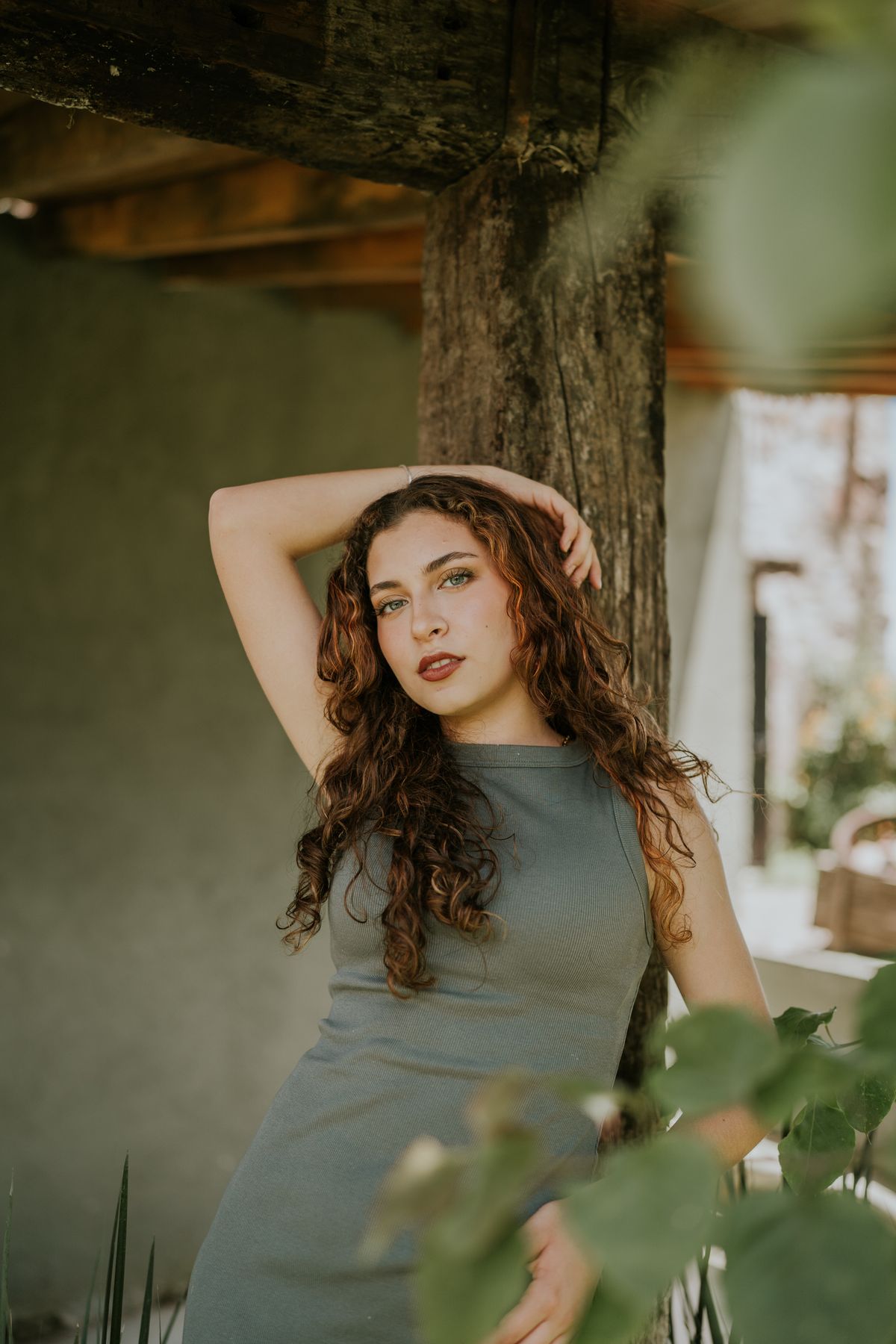 Smiling Woman Posing Outdoors in Sunlight · Free Stock Photo