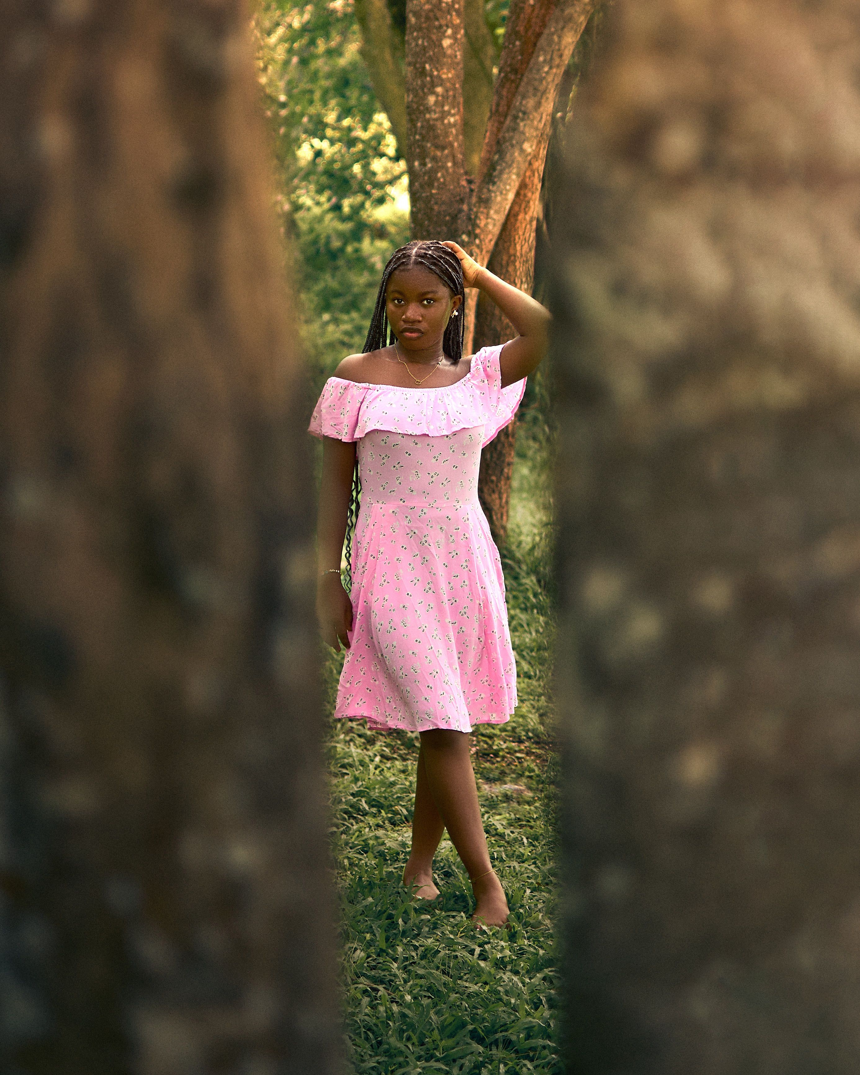 Young Woman in Pink Dress Among Trees Outdoors · Free Stock Photo
