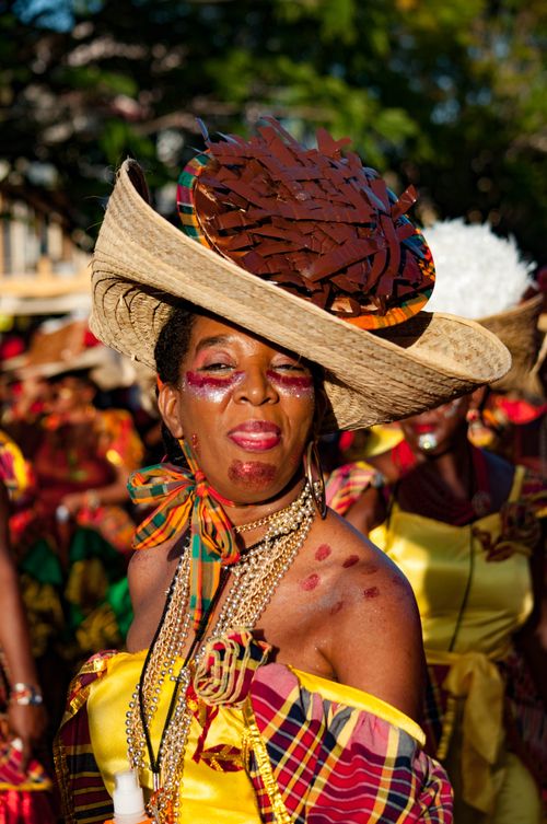 Free Colorful Caribbean carnival with traditional costumes and lively atmosphere. Stock Photo