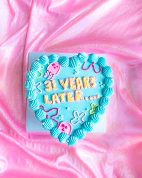 Celebrate 31 years with a fun heart-shaped cake. Perfect for birthdays or special occasions.