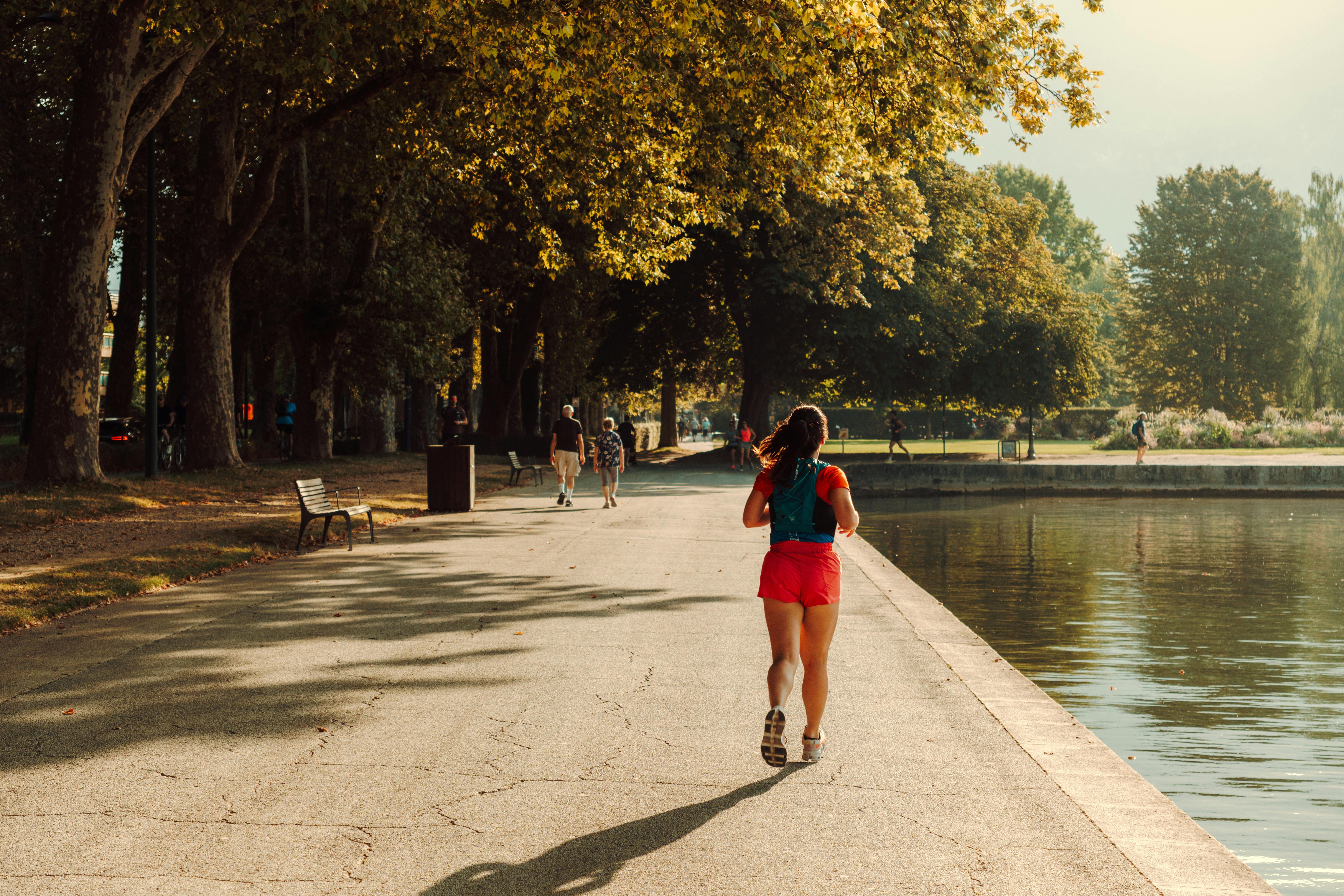 Person enjoying a jog in a serene park, symbolizing healthy coping mechanisms for withdrawal. - The Vaping Withdrawal Timeline (and What to Expect When You Quit)