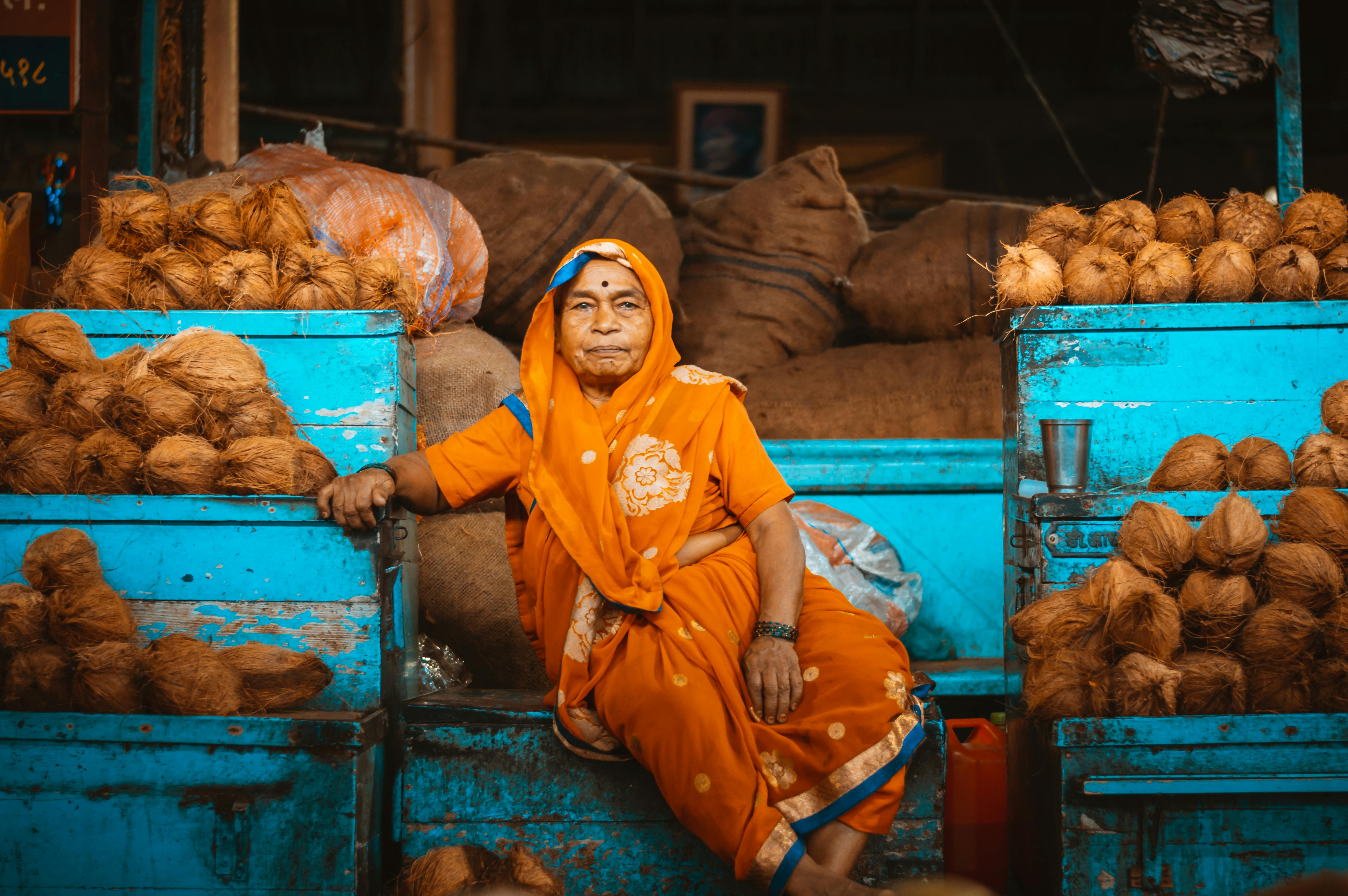 Woman Sitting on Containers