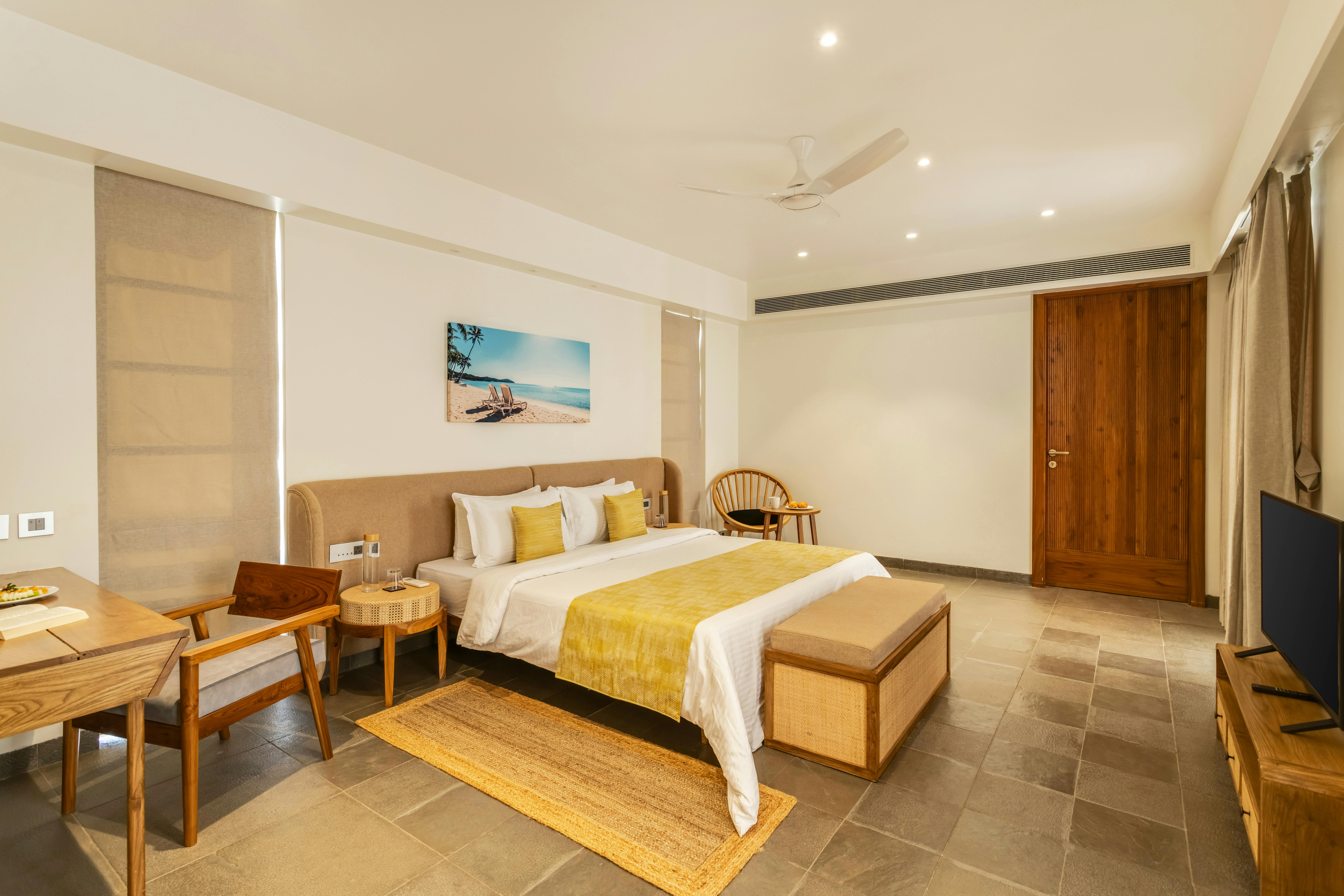 Elegant modern villa bedroom in Goa, featuring luxury decor and minimalist design.