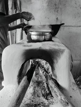 Experience traditional Brazilian cooking techniques with a wood-fired clay stove in Rio Vermelho.