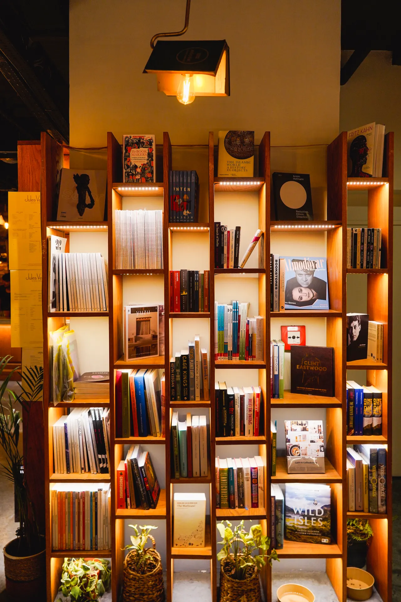 bookshelf-lighting-ideas Cube bookshelves with warm lighting glowing behind books and decor