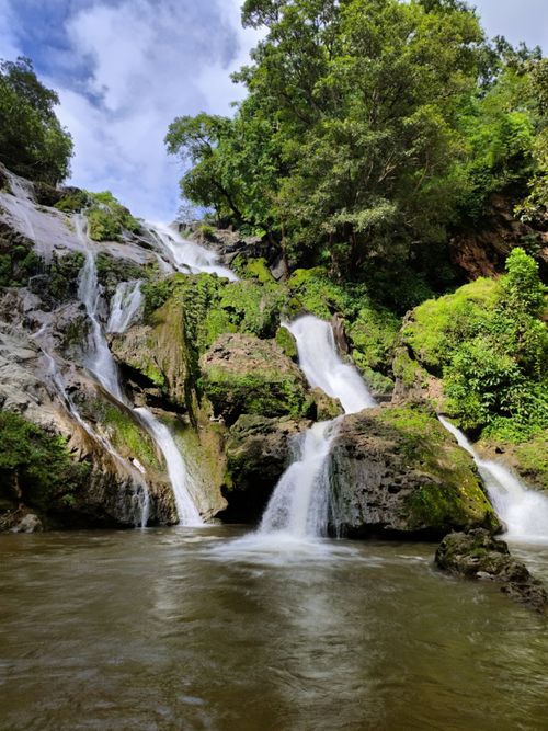 Free Explore a picturesque waterfall surrounded by vibrant greenery in Chhattisgarh, India. Stock Photo