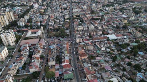 Free High-angle aerial view of urban landscape in Maputo, Mozambique, showcasing dense city buildings and streets. Stock Photo