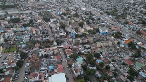 Free An aerial view capturing the urban landscape of Maputo, Mozambique, showcasing residential and commercial buildings. Stock Photo
