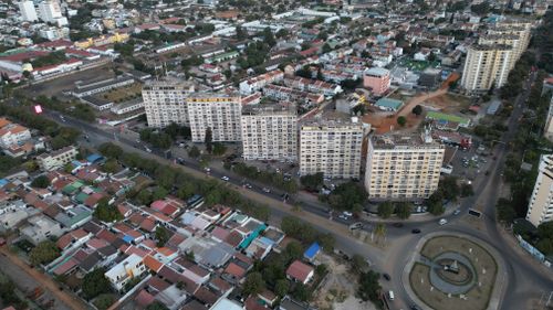 Free Aerial cityscape showcasing residential and urban areas in Maputo, Mozambique. Stock Photo