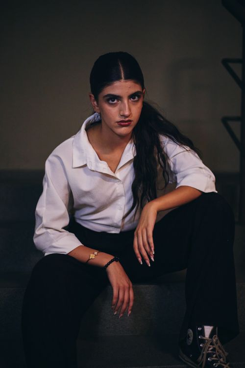 Free Modern portrait of a confident young woman in Istanbul, showcasing urban fashion. Stock Photo