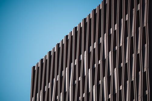Free Close-up of a modern building facade in Hamburg, Germany under clear blue sky. Stock Photo
