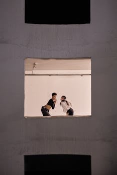 Fashion editorial image featuring a stylish couple posing in an Istanbul studio.